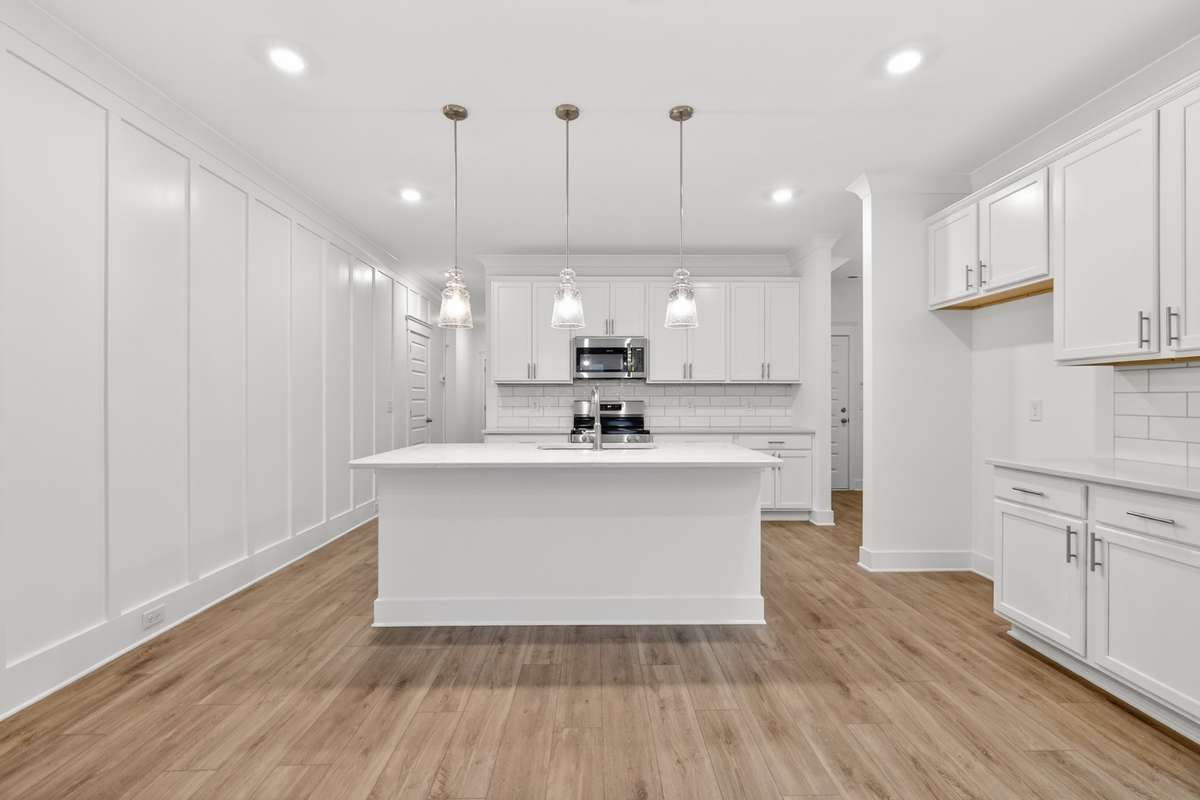 *Photos are of a model home and may not fully represent selections and features of the subject property.