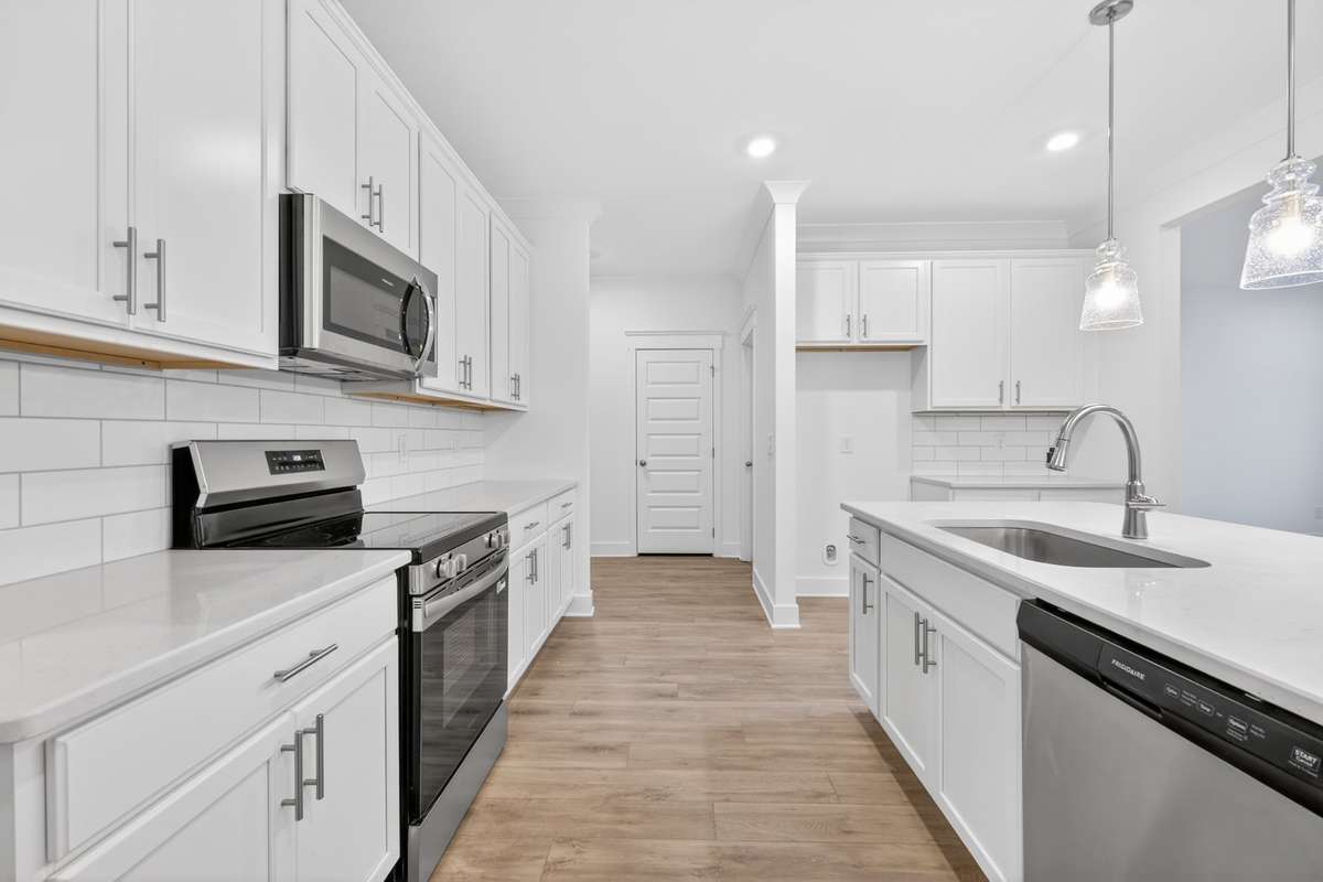 *Photos are of a model home and may not fully represent selections and features of the subject property.