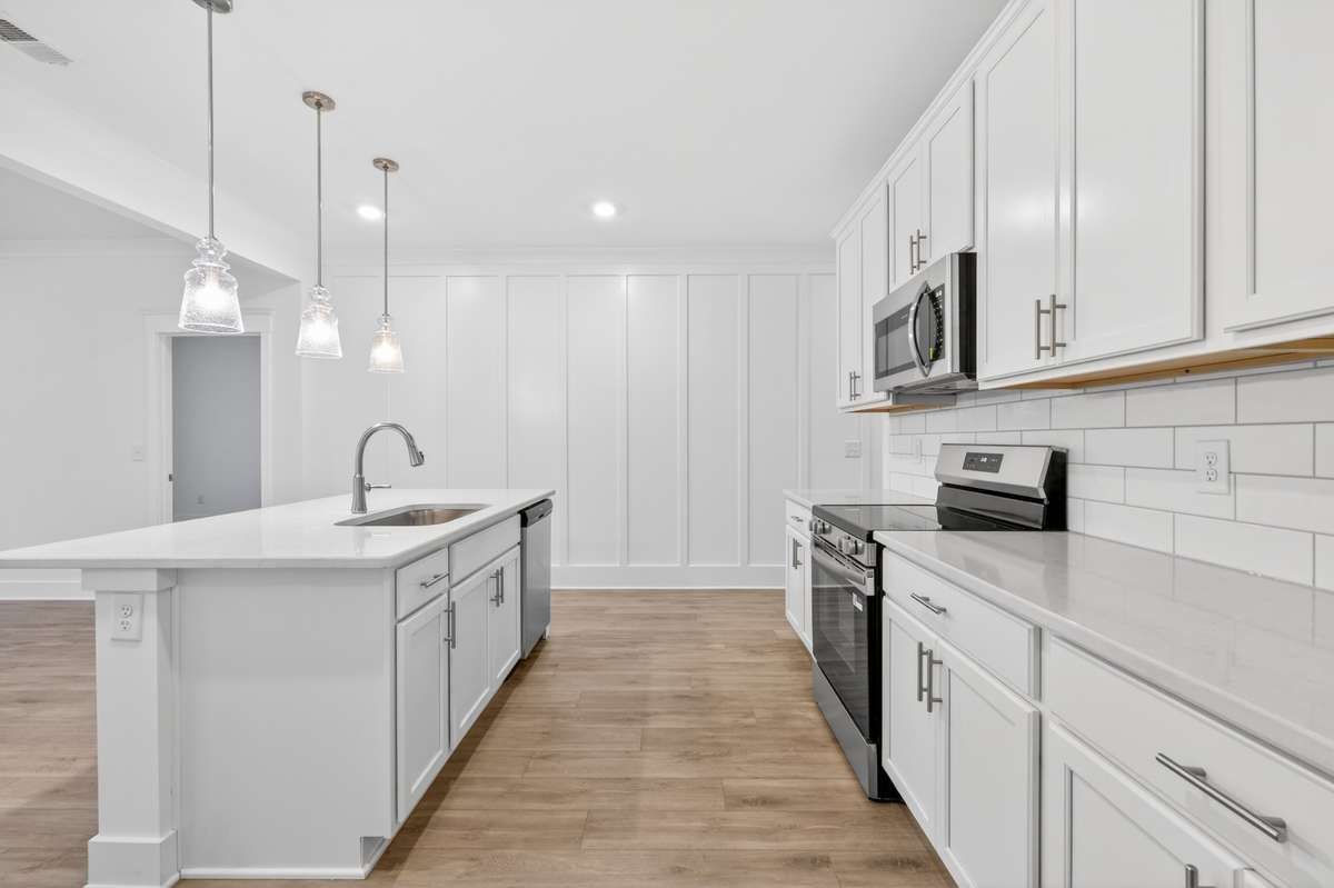 *Photos are of a model home and may not fully represent selections and features of the subject property.