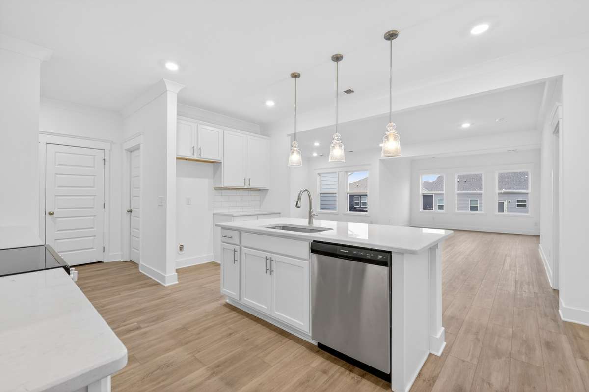 *Photos are of a model home and may not fully represent selections and features of the subject property.