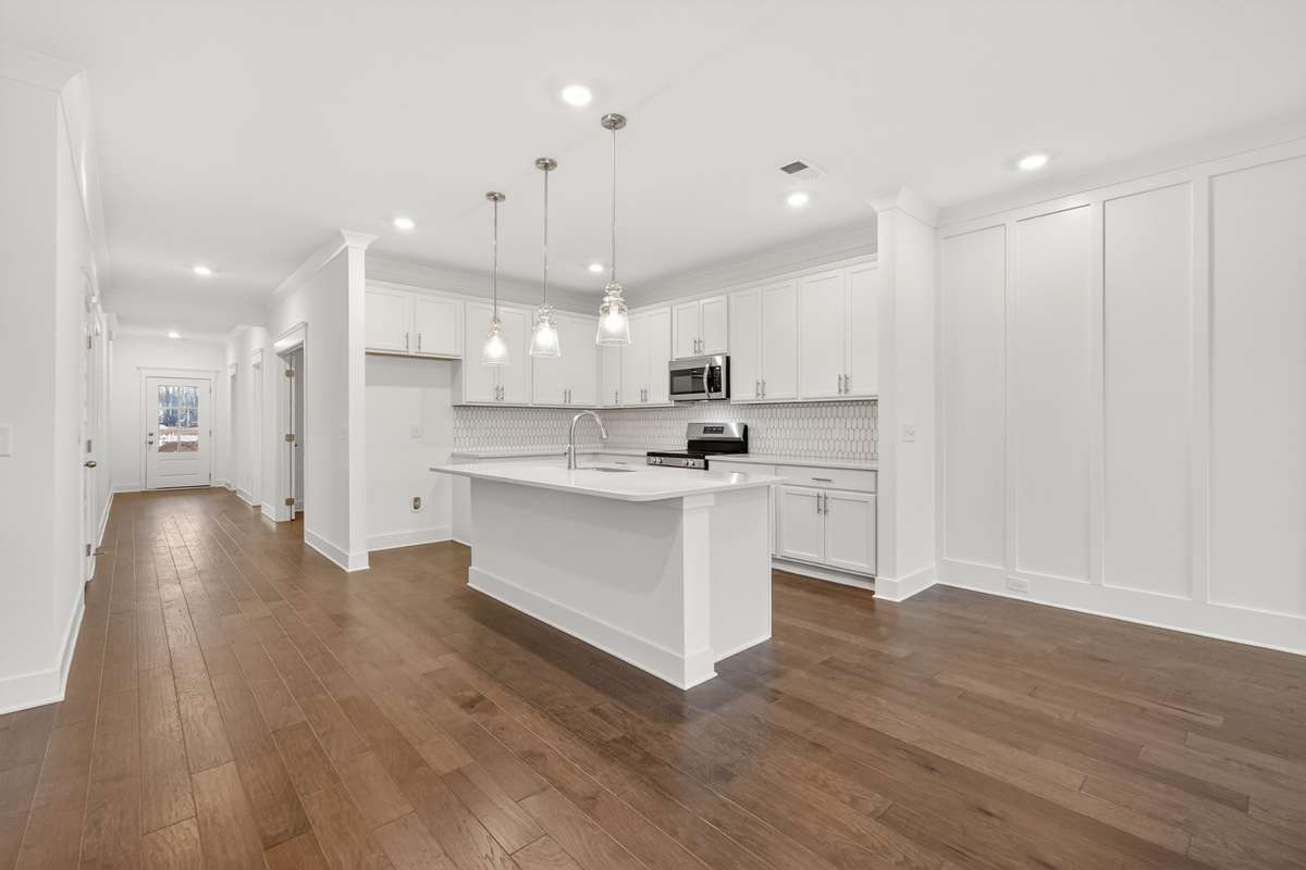 *Photos are of a model home and may not fully represent selections and features of the subject property.