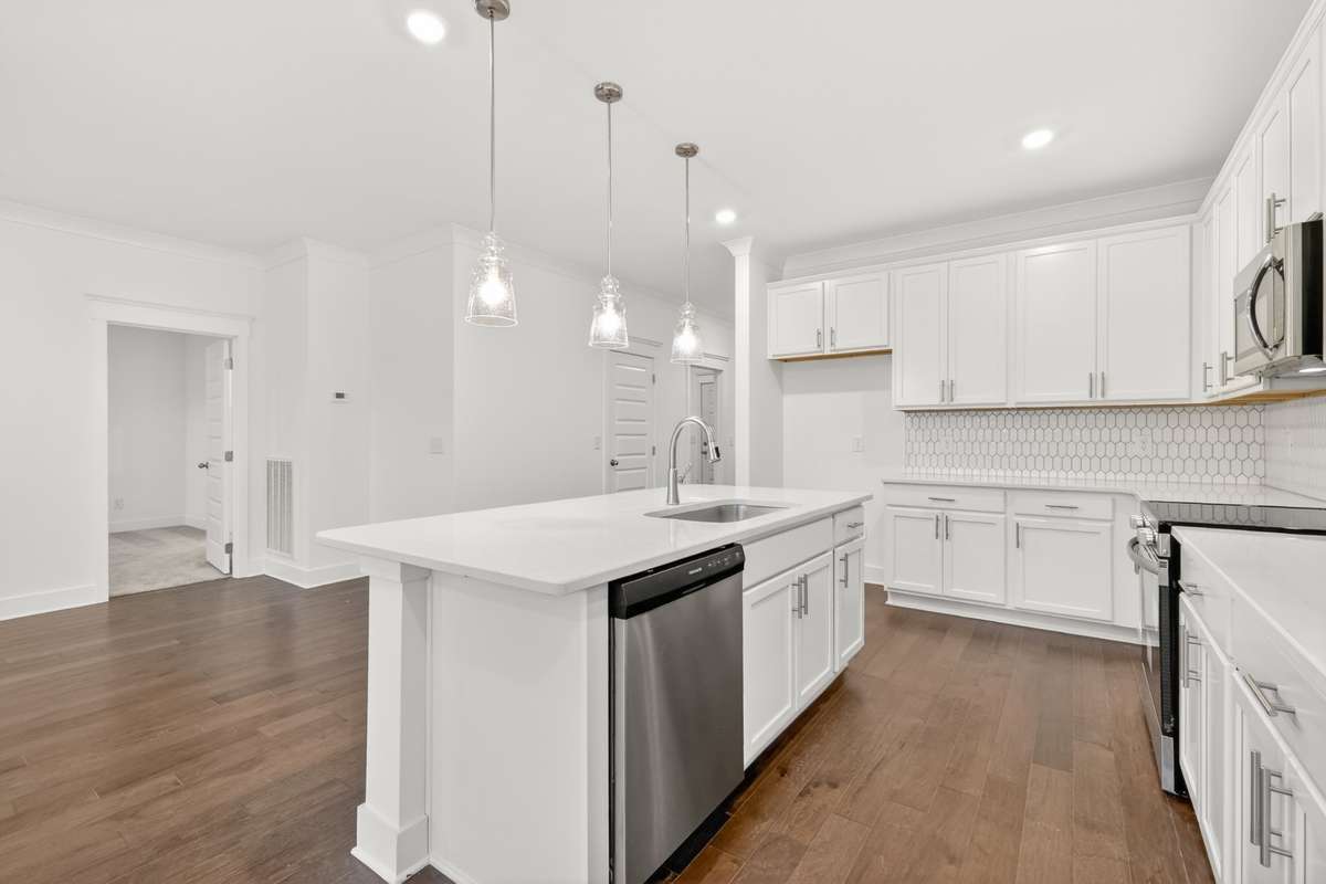 *Photos are of a model home and may not fully represent selections and features of the subject property.