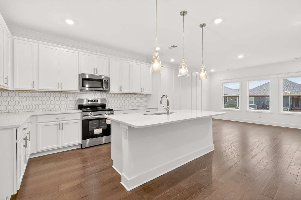 *Photos are of a model home and may not fully represent selections and features of the subject property.