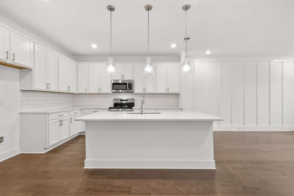 *Photos are of a model home and may not fully represent selections and features of the subject property.