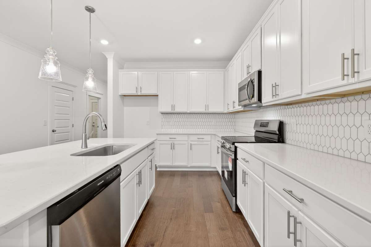 *Photos are of a model home and may not fully represent selections and features of the subject property.