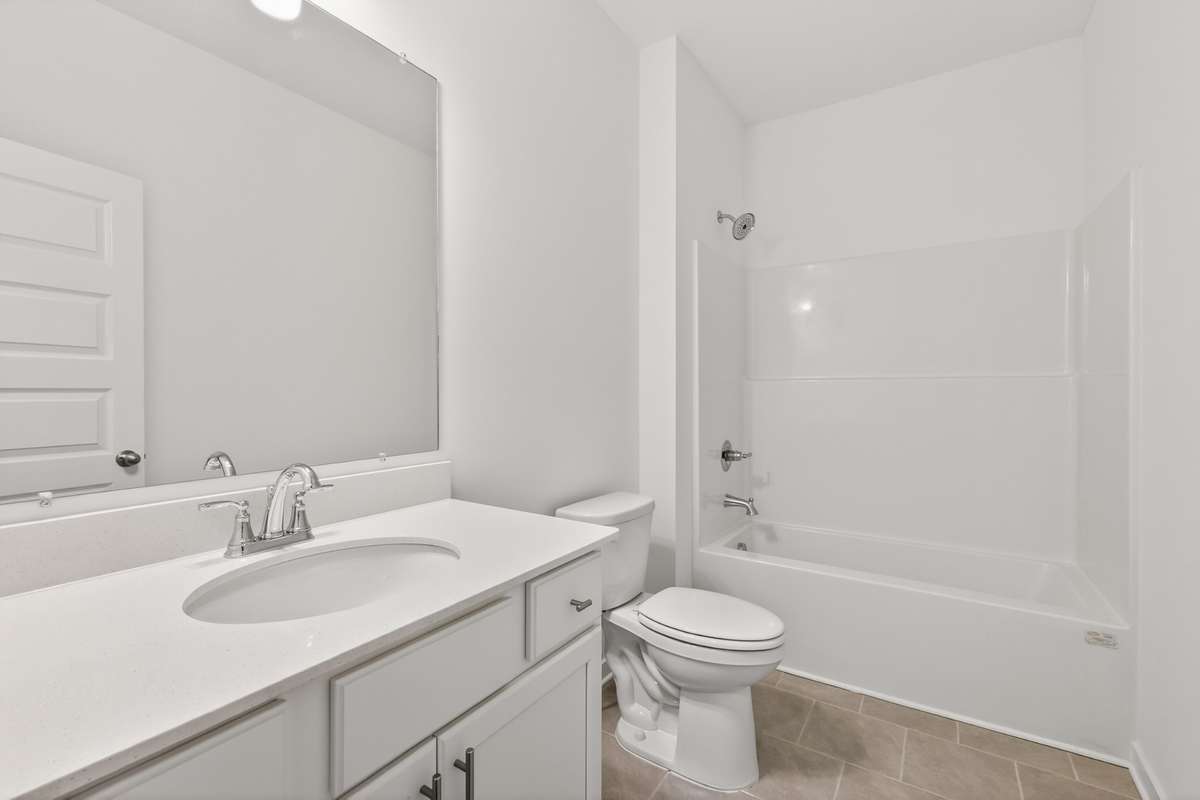 *Photos are of a model home and may not fully represent selections and features of the subject property.