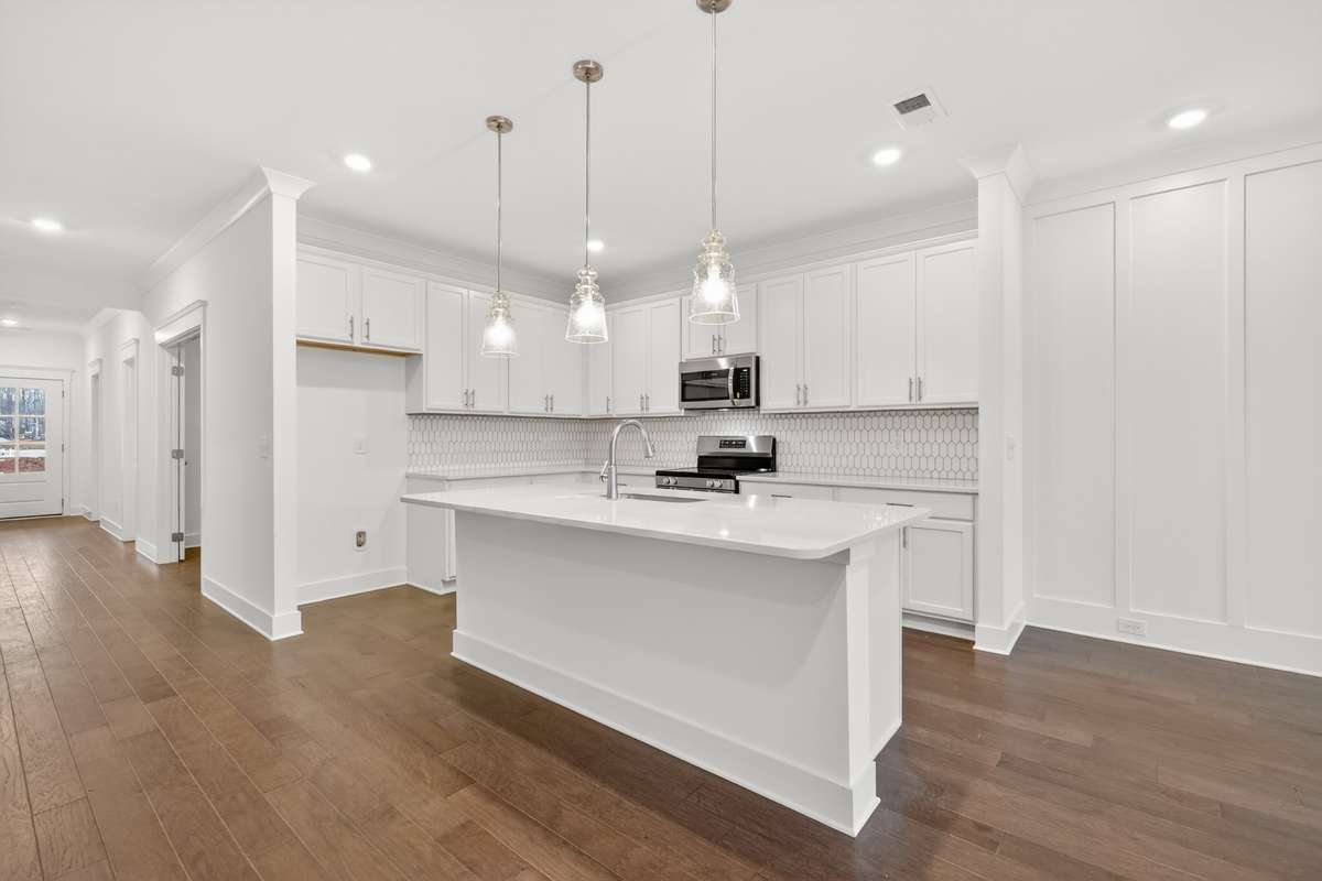 *Photos are of a model home and may not fully represent selections and features of the subject property.