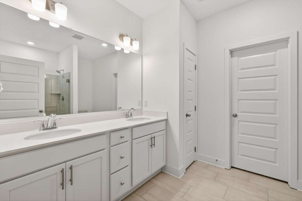 *Photos are of a model home and may not fully represent selections and features of the subject property.