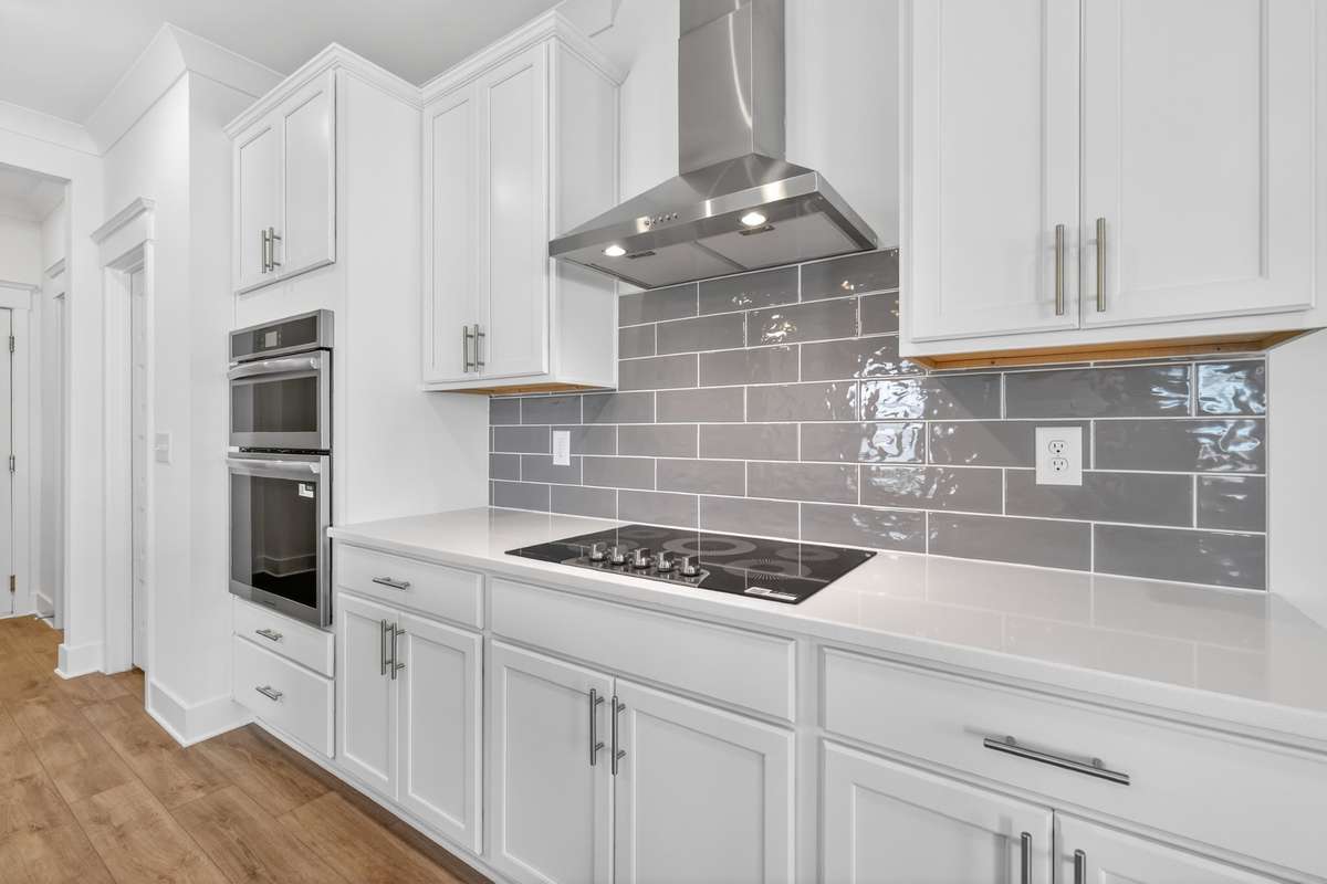 **Photos are of a model home and will not match all selections in subject property**