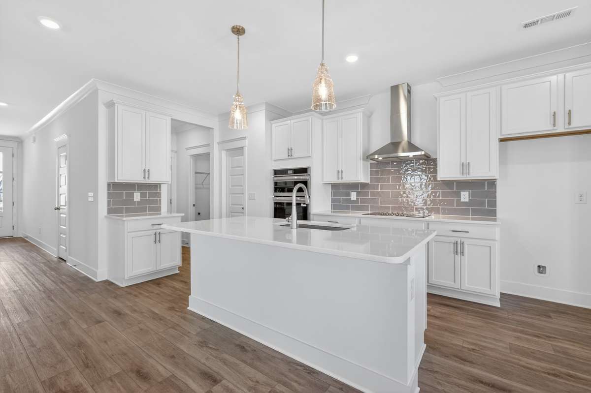 **Photos are of a model home and will not match all selections in subject property**