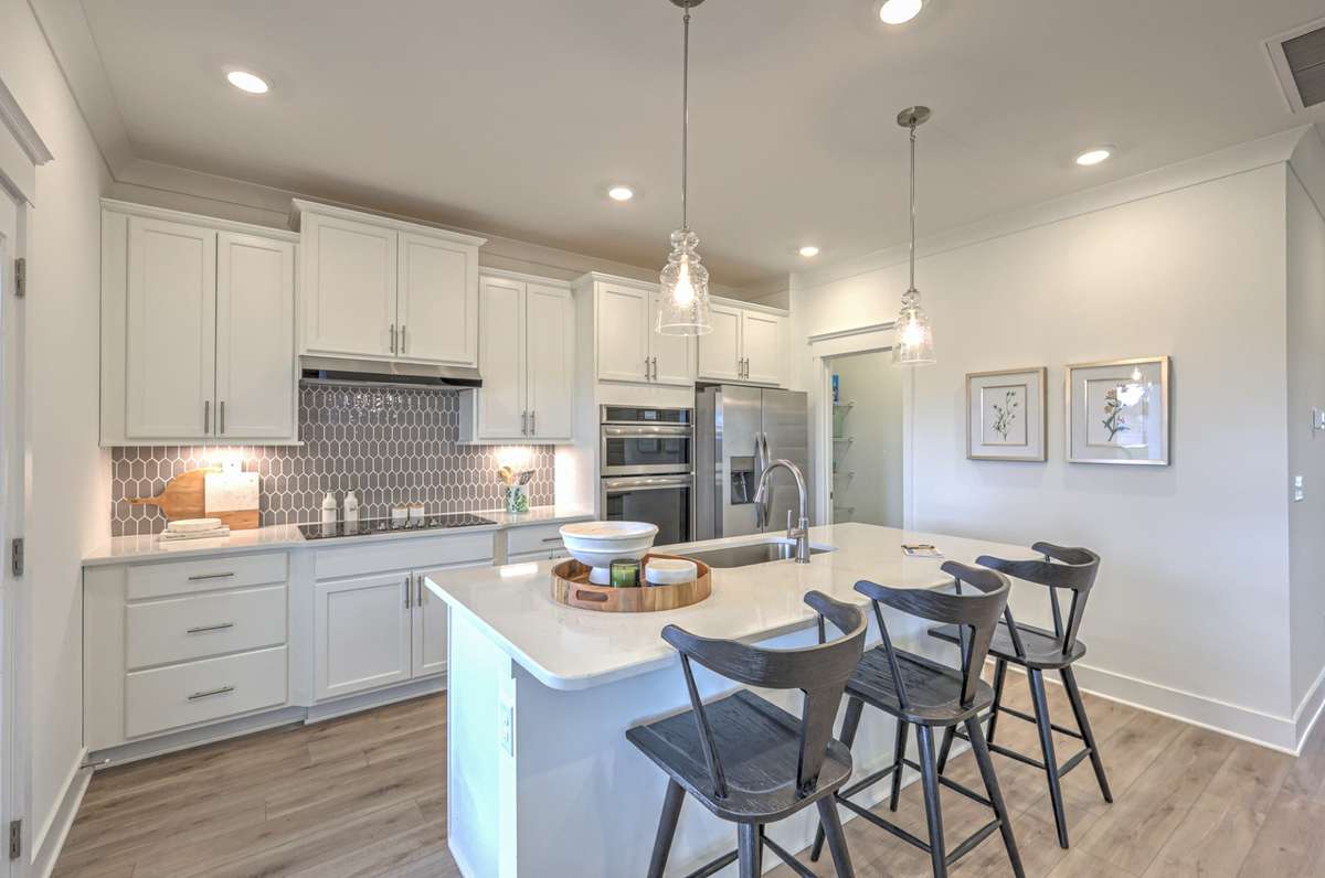 **Photos are of a model home and will not match all selections in subject property**