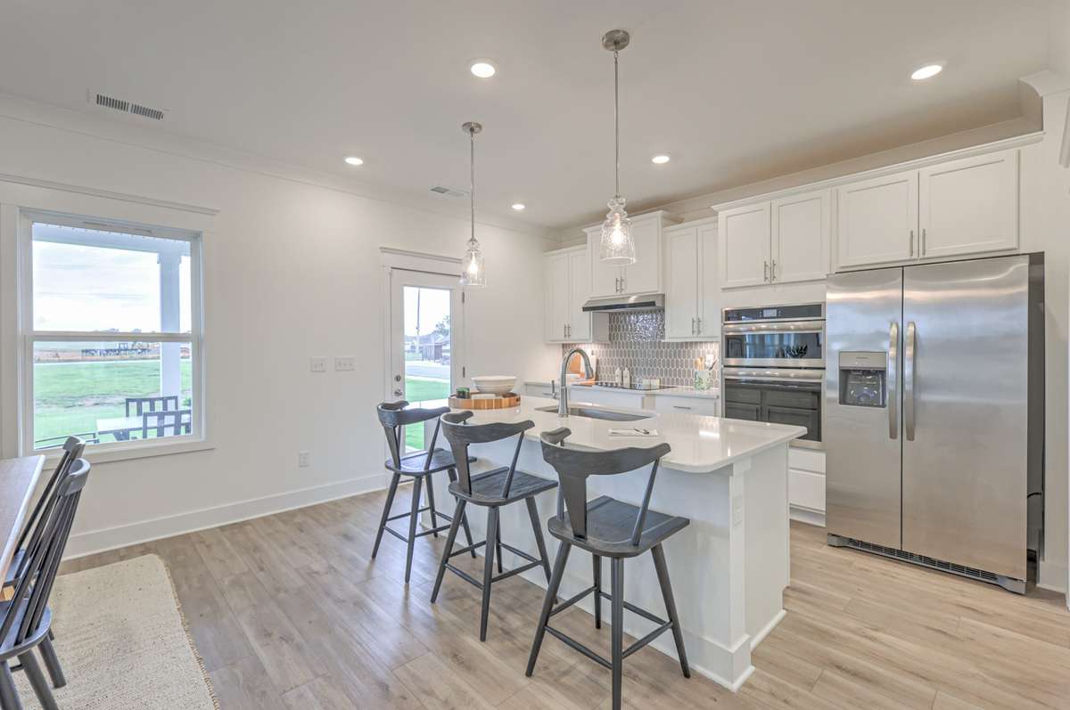 **Photos are of a model home and will not match all selections in subject property**