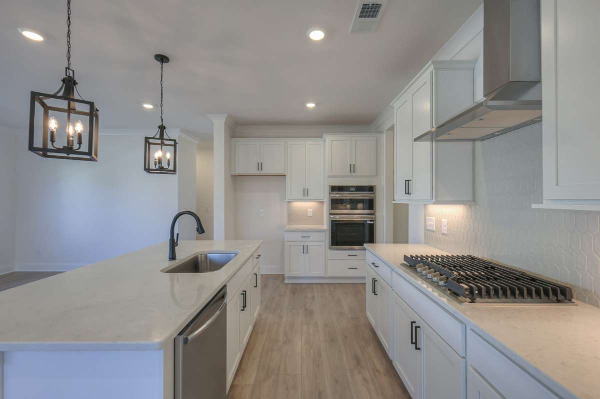 **Photos are of a model home and will not match all selections in subject property**