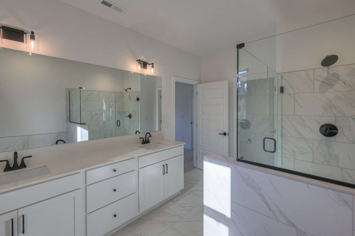 **Photos are of a model home and will not match all selections in subject property**