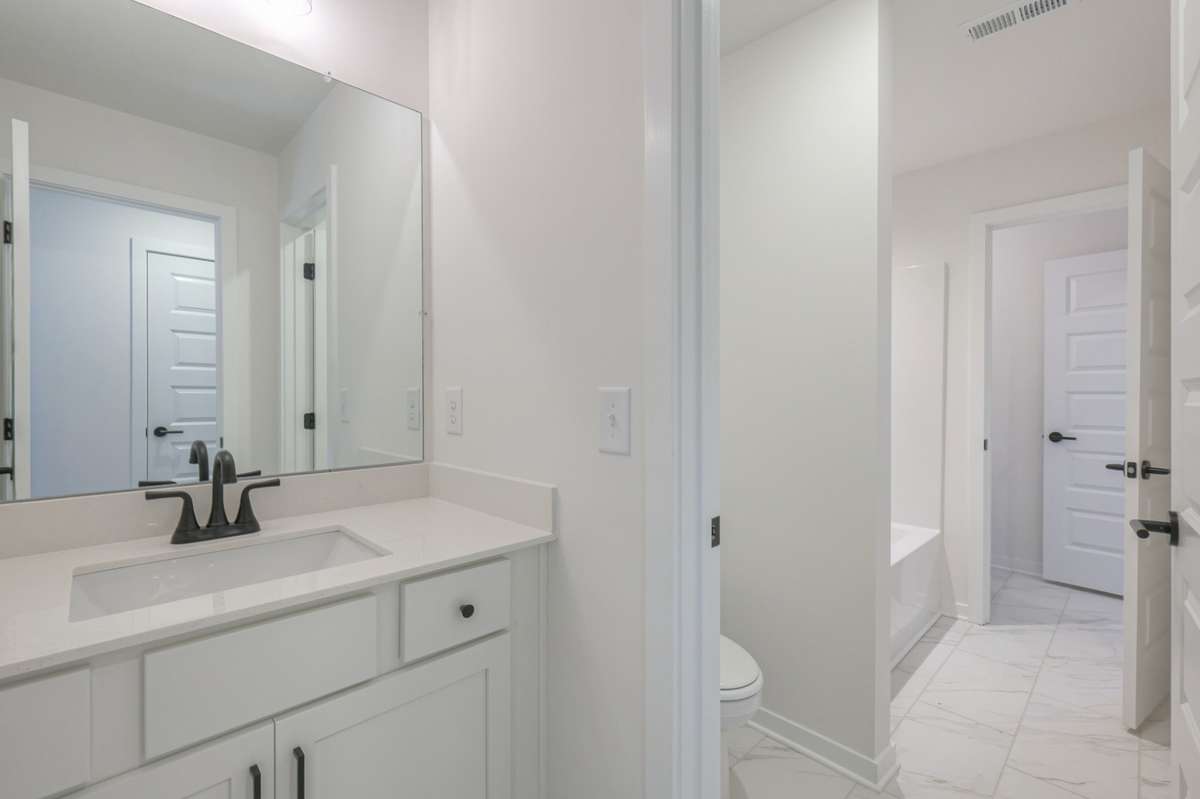 **Photos are of a model home and will not match all selections in subject property**