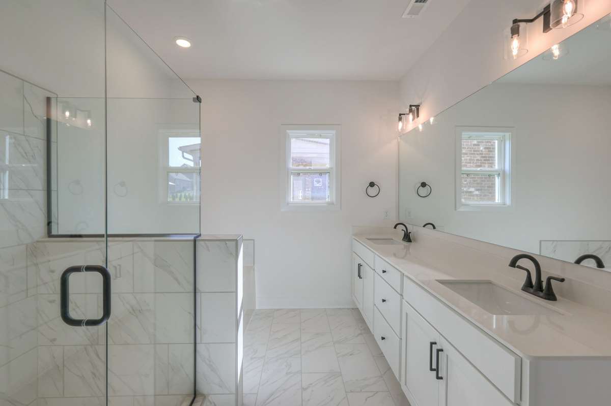 **Photos are of a model home and will not match all selections in subject property**