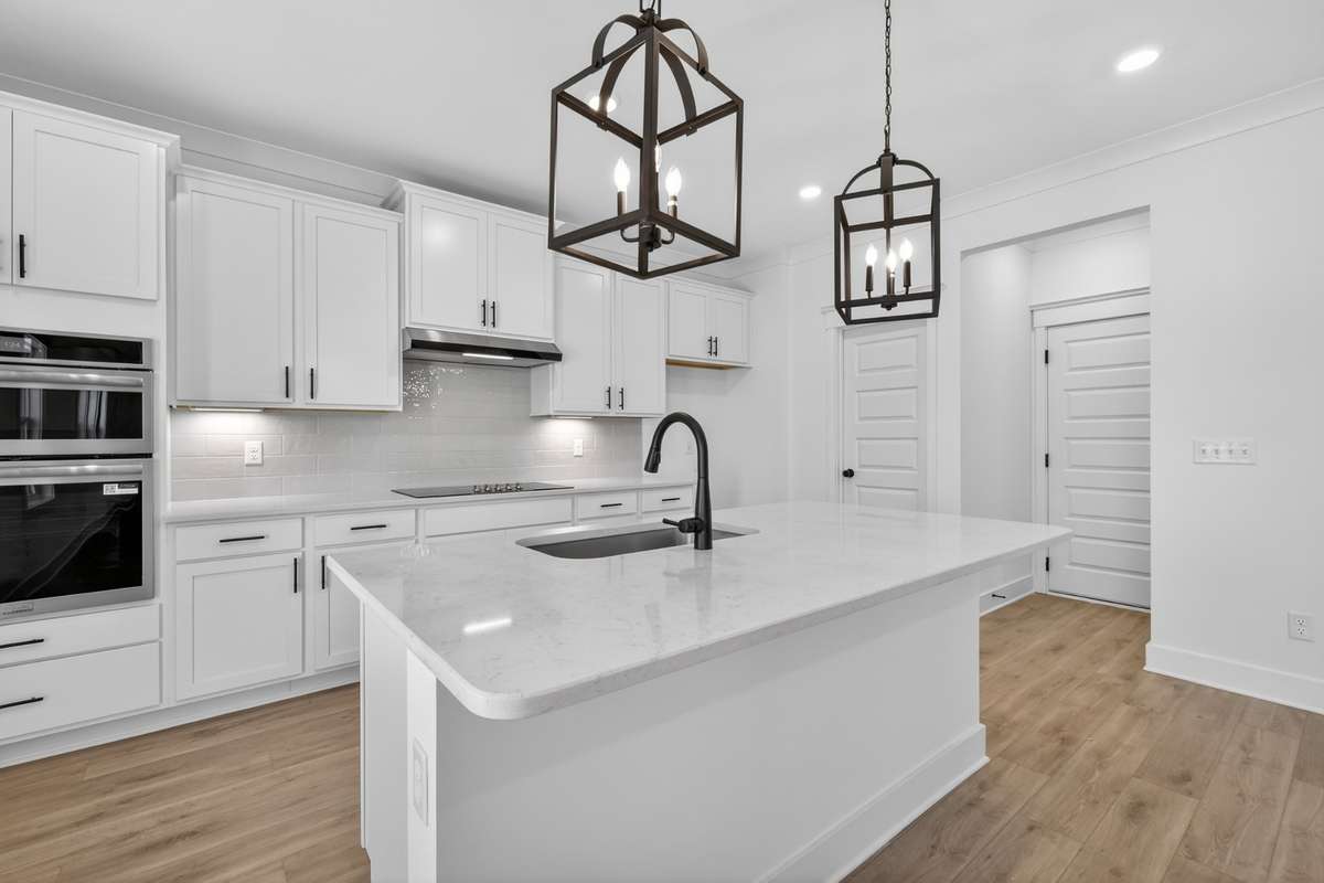 **Photos are of a model home and will not match all selections in subject property**