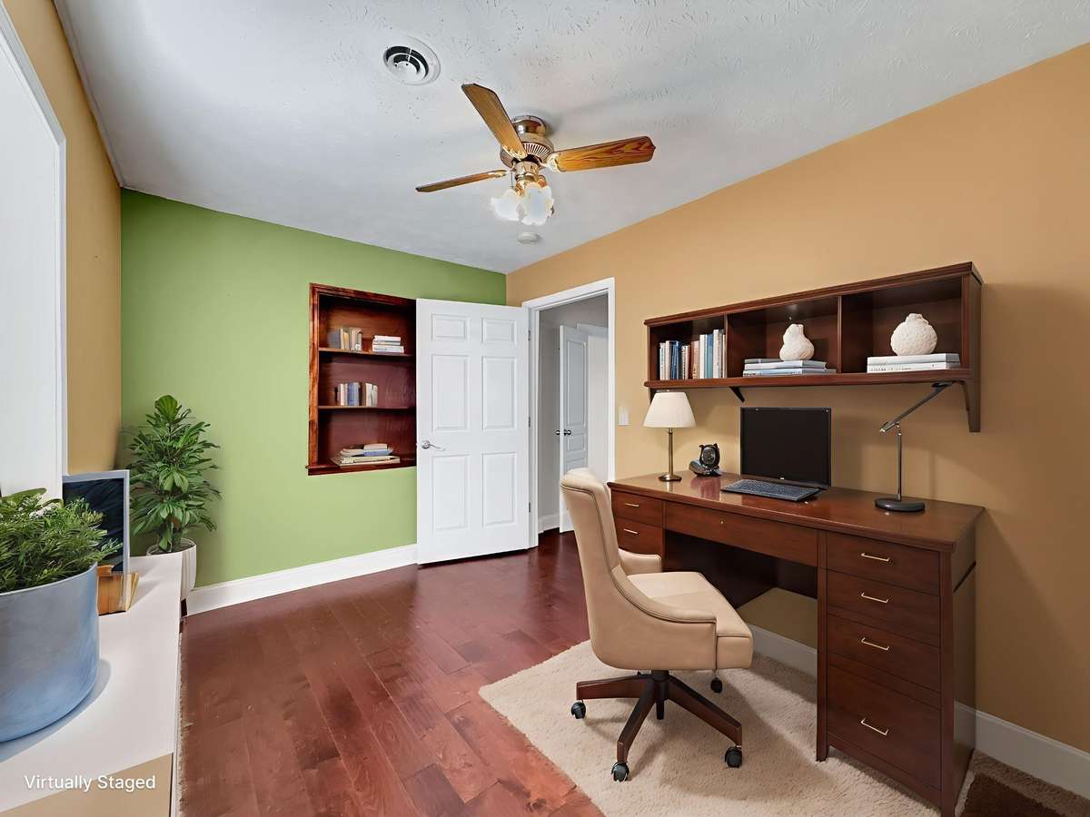 Main-level flex room that would make an excellent home office or creative space.