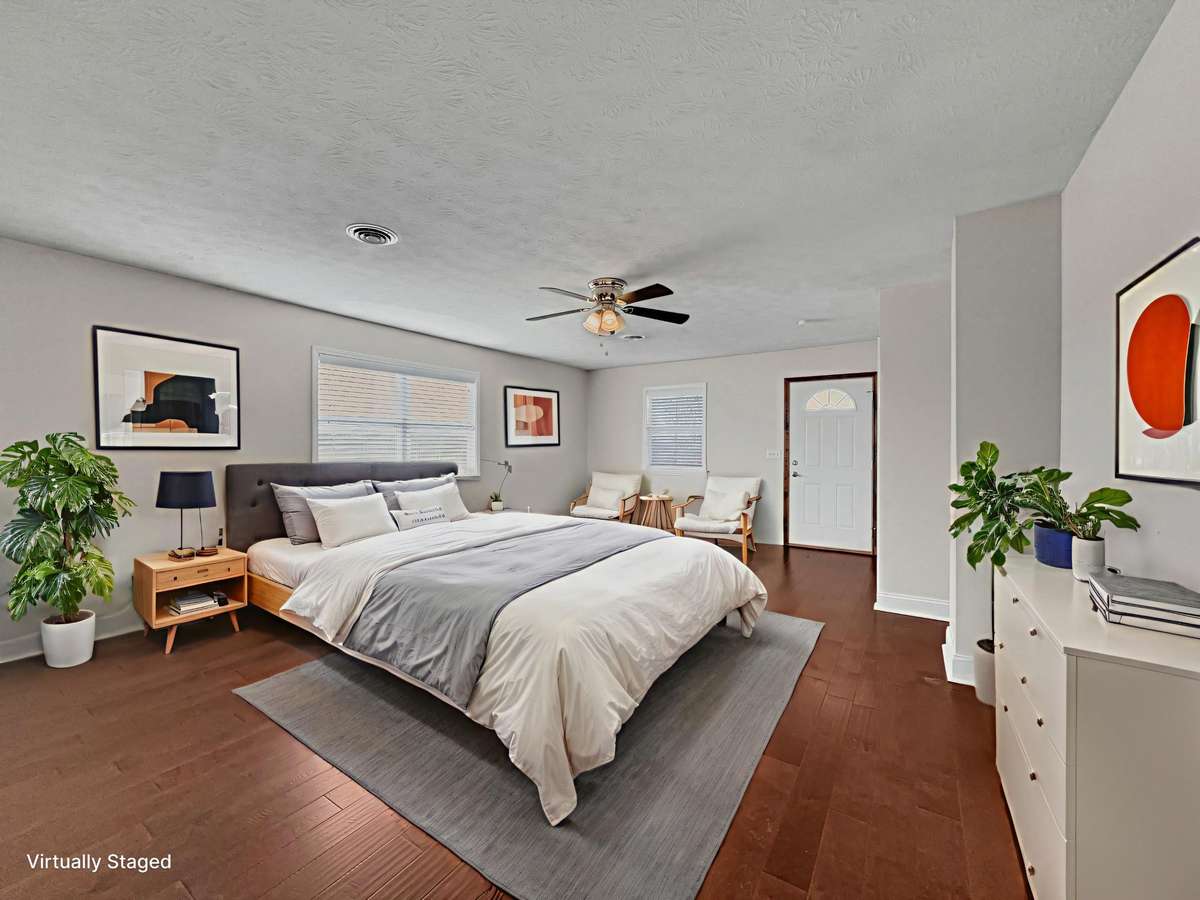 Main-level second bedroom featuring a separate private entrance.