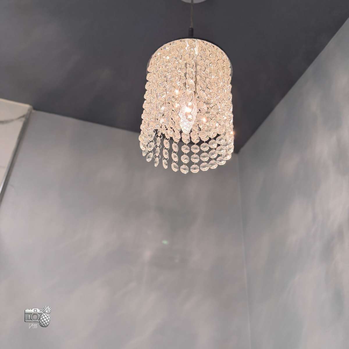 Chandeliers in the bathroom over the toilet and entry - these are on dimmer switches and can set the mood!