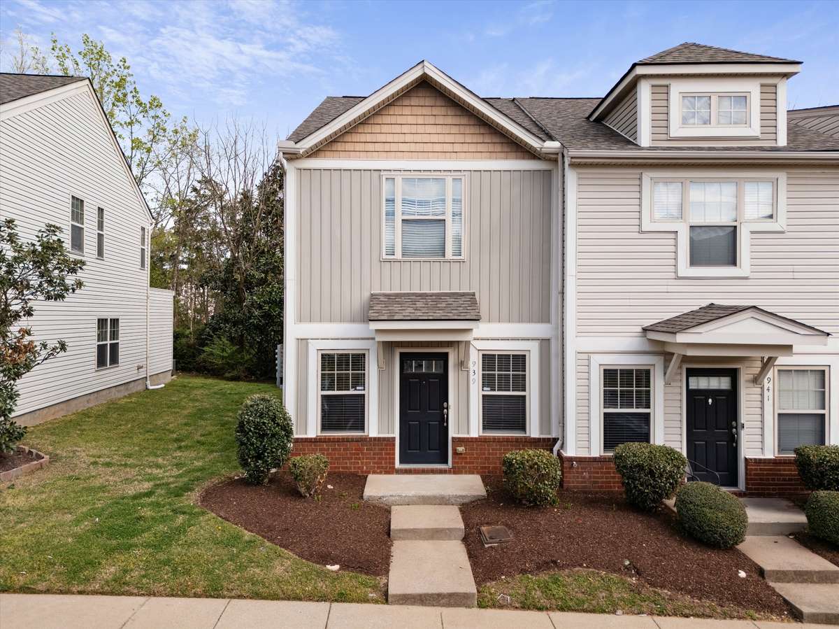 Clean, classic front elevation with a welcoming entry and well-maintained landscaping 