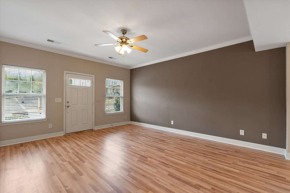 Spacious living area with great natural light and plenty of room to relax or entertain 