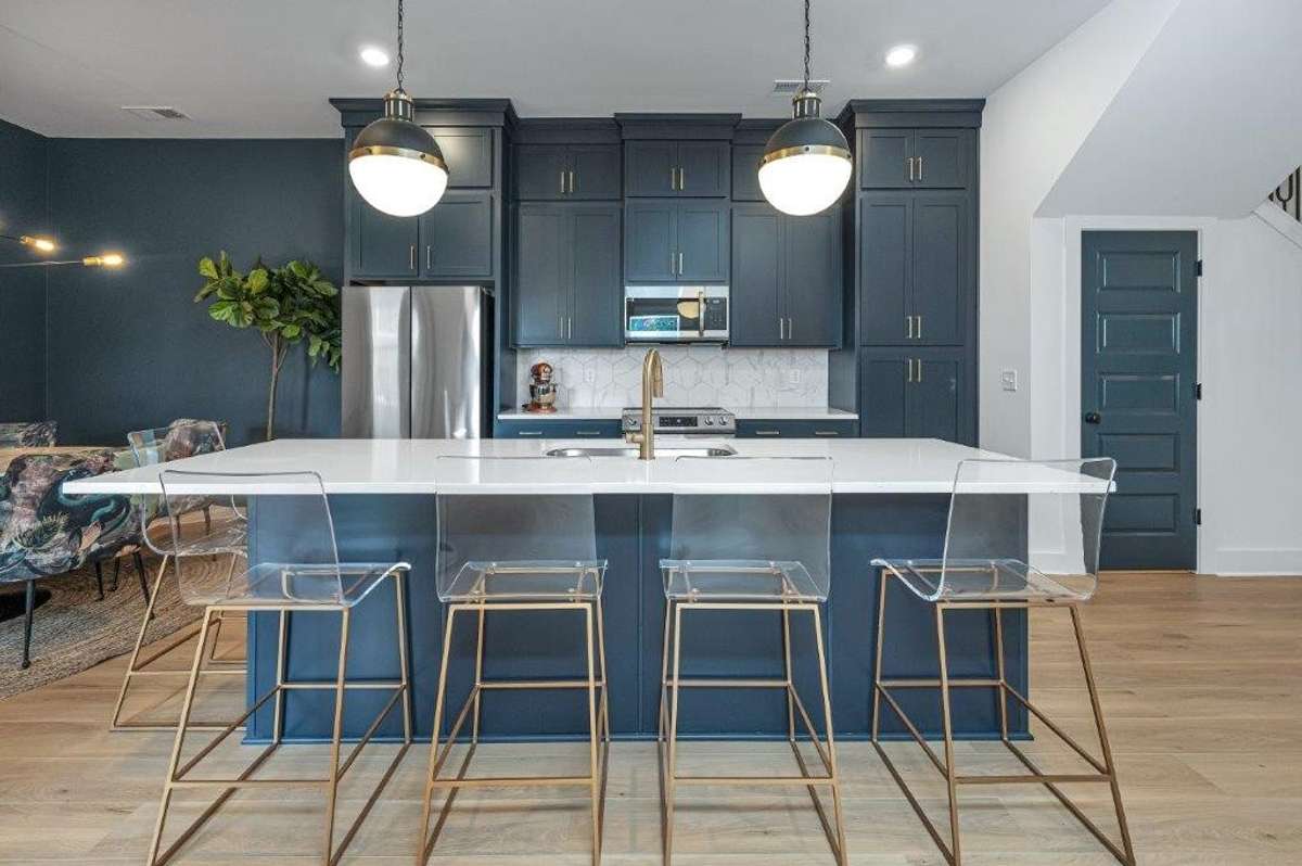 Pictures are of finished model at another community. Final finishes to vary.