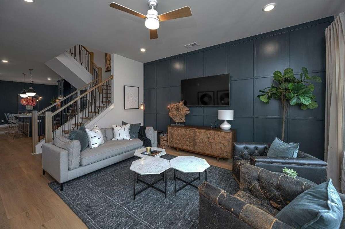 Pic is of another model home. The 20 foot living room ceiling is not pictured but it is INCLUDED in the base price!