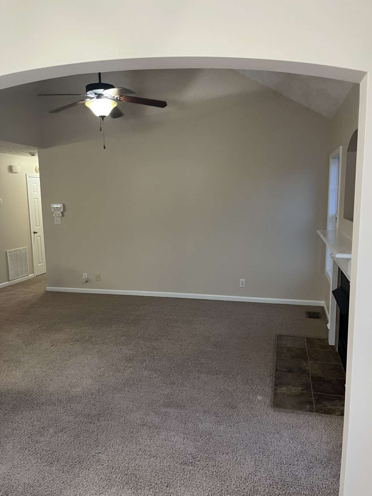 View from eat-in area of Kitchen into the Living Room