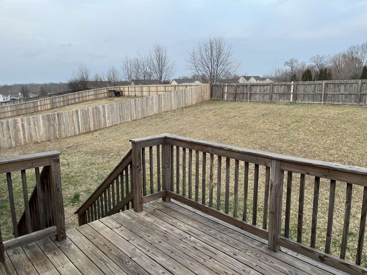 6 foot privacy fence totally encloses the back yard.