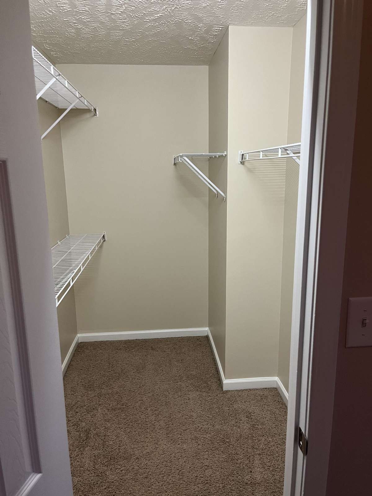 Walk-in closet in Primary Bedroom