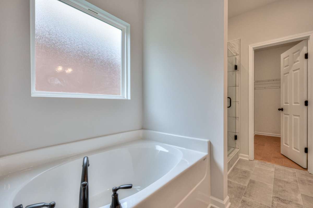 This photo is a sample of the Cleveland floorplan.  Options and exterior will vary depending on customer selections and preferences.