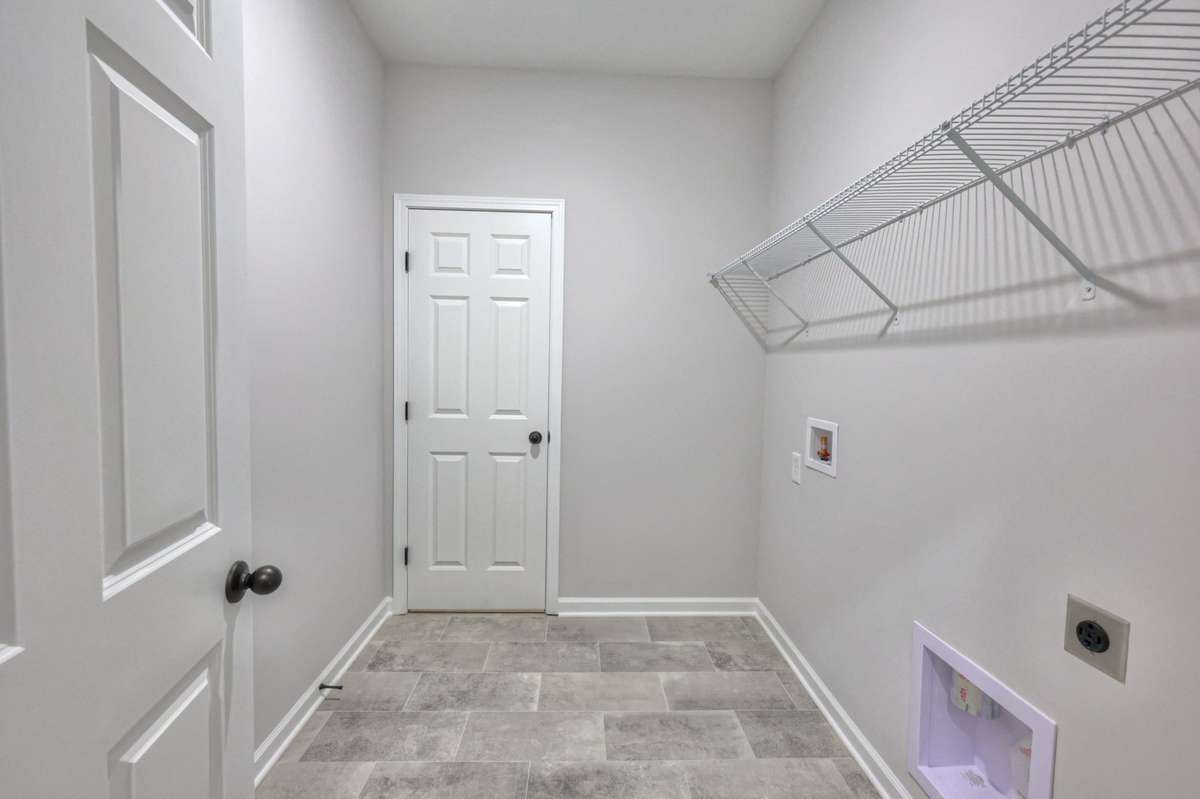 This photo is a sample of the Cleveland floorplan.  Options and exterior will vary depending on customer selections and preferences.