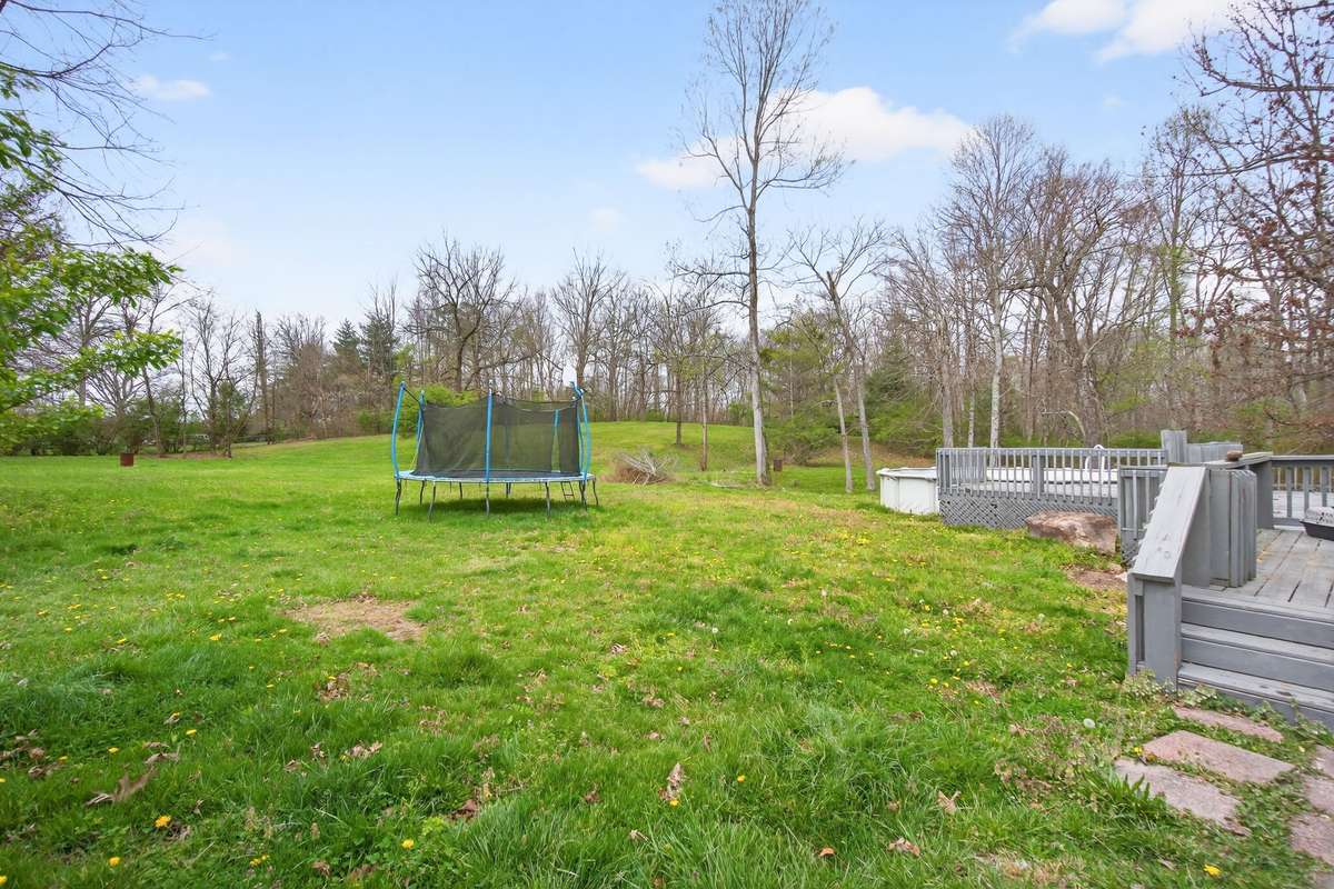 large back yard - fire pit
