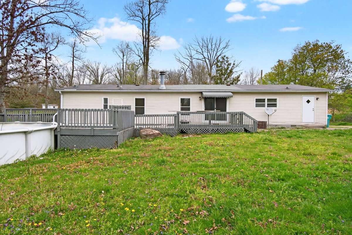 Large deck surrounds pool