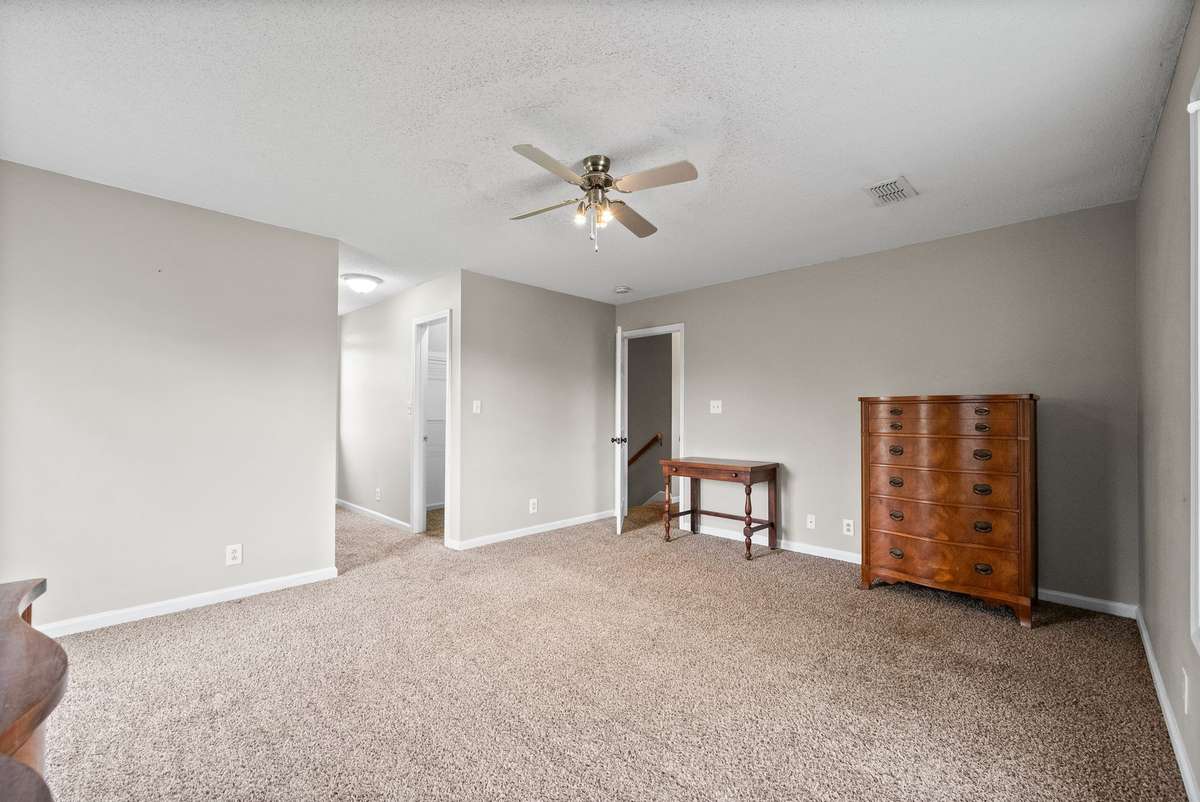 Upstair room with his and hers closets