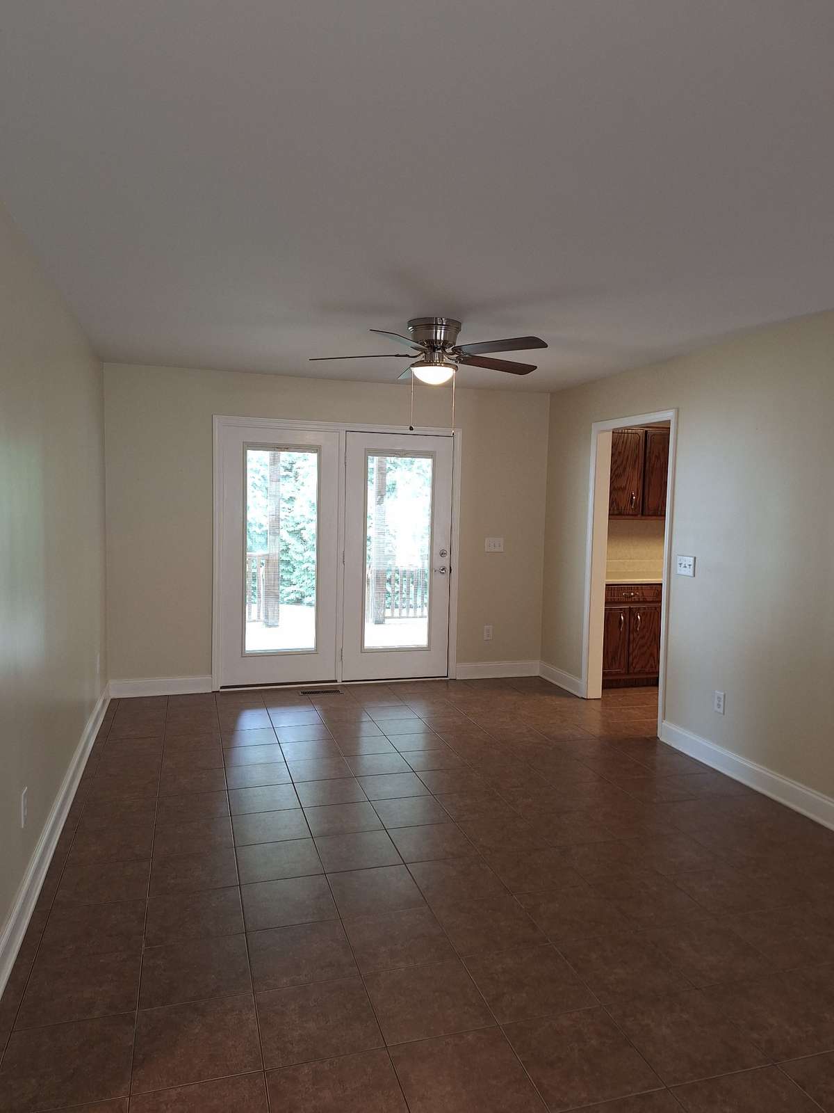 Large Dining Room with tile floors just off the kitchen!