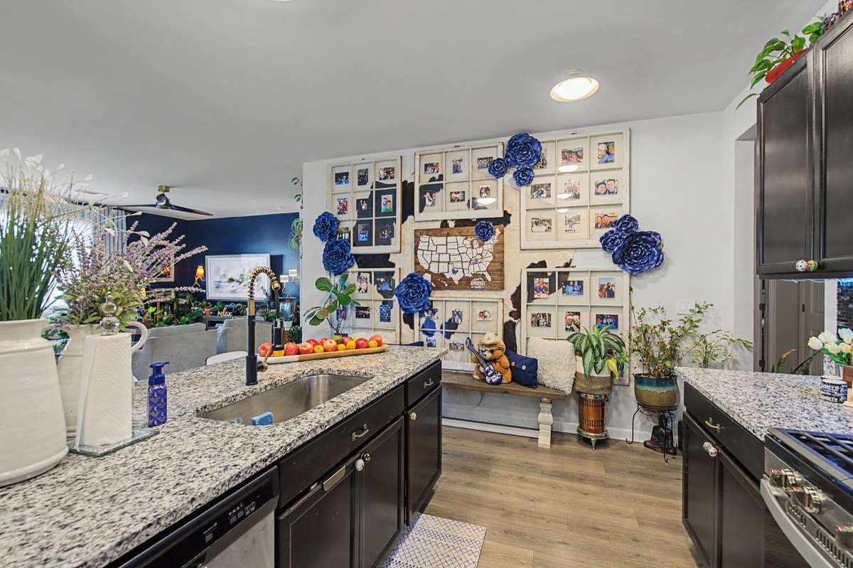 Kitchen (Island): Expansive granite island with a deep double-sink and plenty of space for casual bar seating