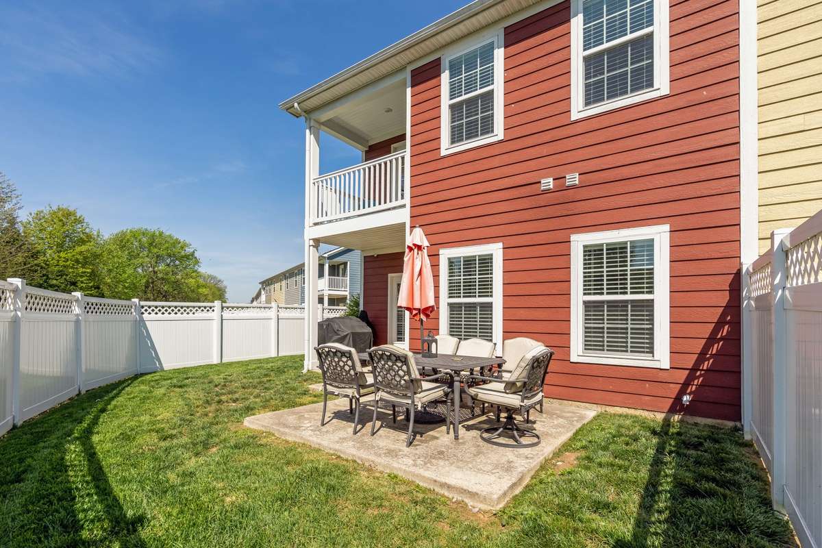 Private fenced-in backyard