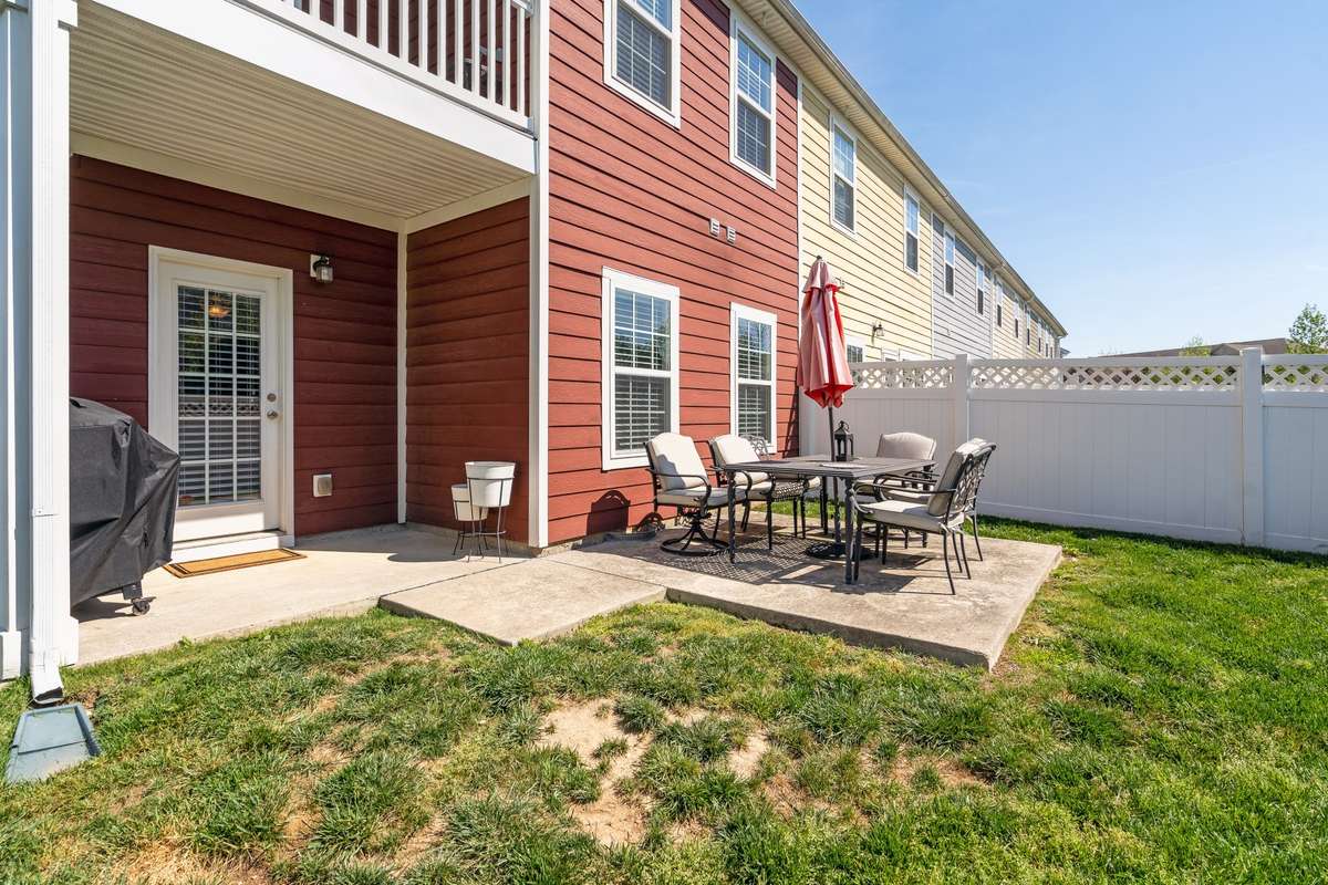 How often do you find a townhome with backyard space AND fenced?!