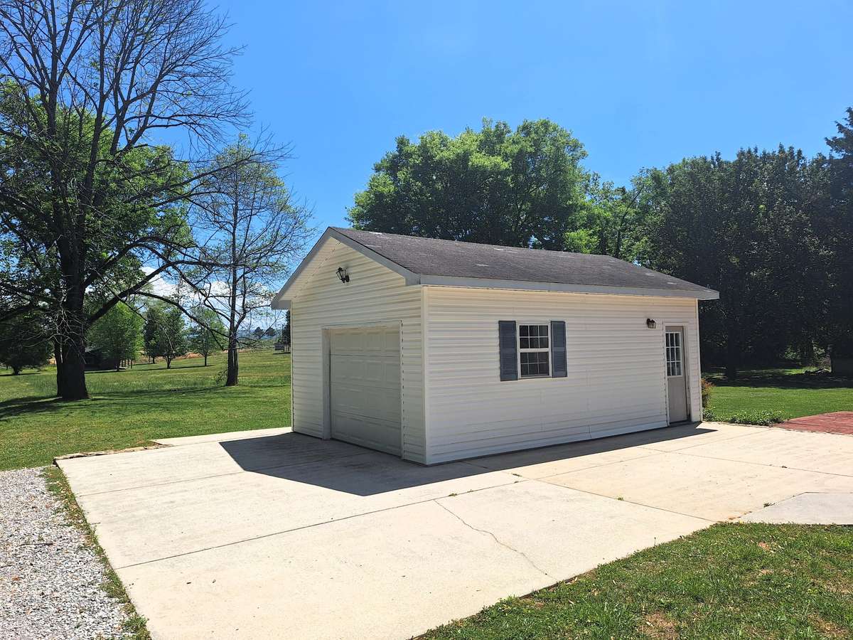 Inside this detached workshop, you will find it already has electricity in place for you too!!