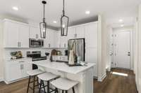 These photos are of our decorated model home. The photos do not represent the specs of this listing. This is for illustrative purposes.