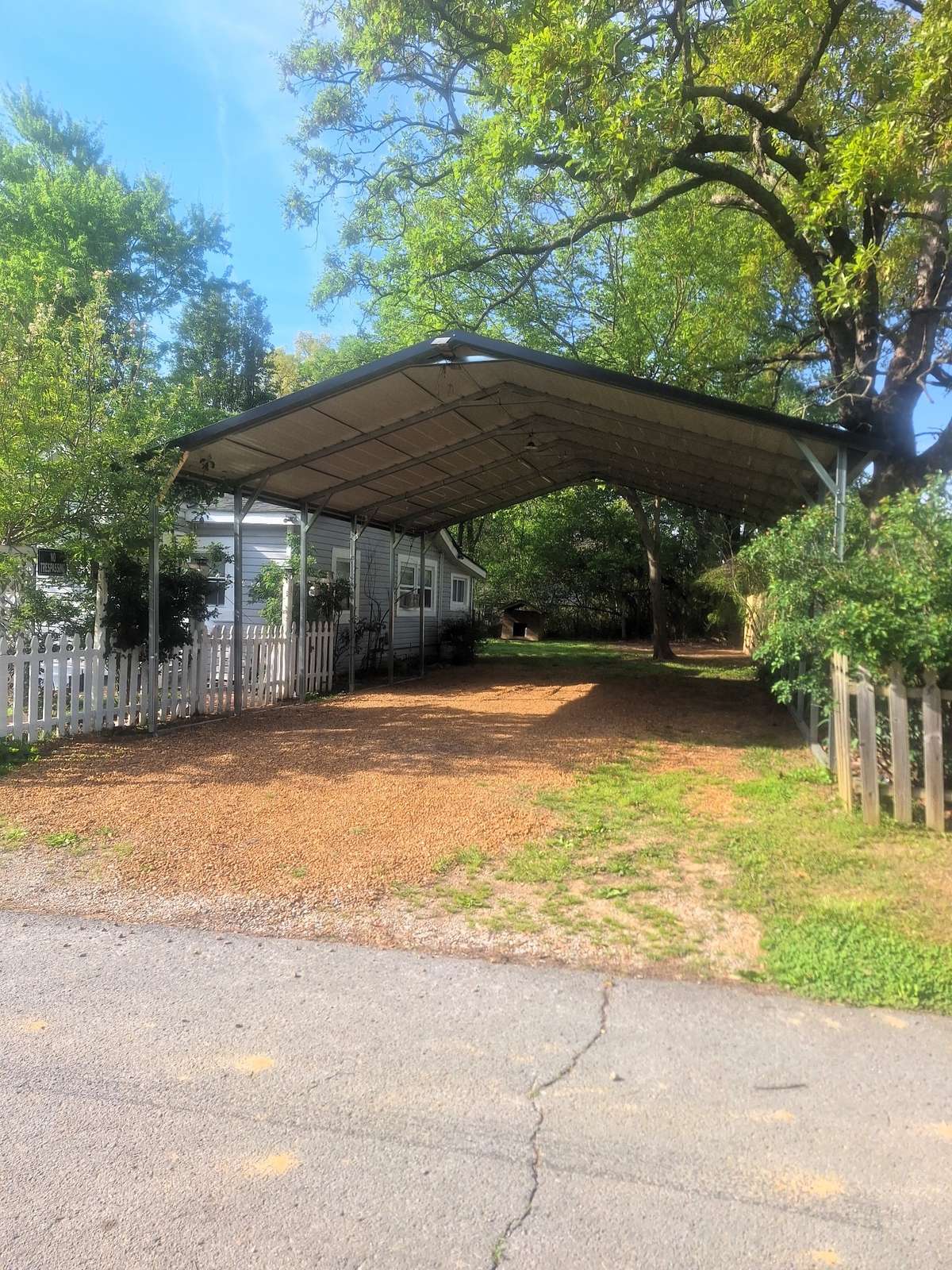 Look at the massive 4 car carport that comes with for no extra price!!