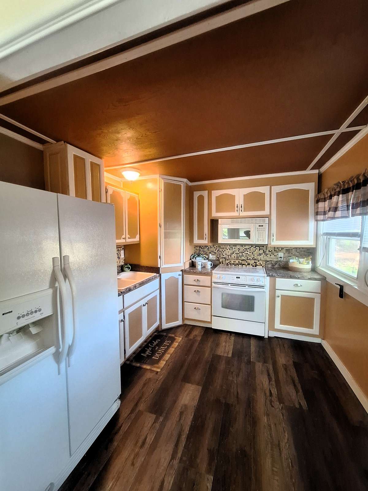 There is even a custom backsplash in the kitchen too!!