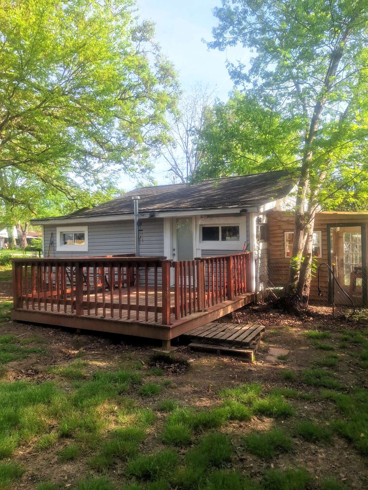 use your Grill here on the back deck or just relax in the evening!! Look to the right of the pic!! thats a functioning green house that is also on the property too!!