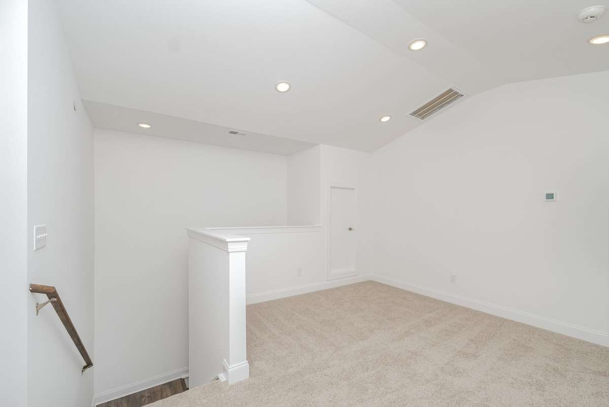 Upstairs Loft w/ walk-in storage, bed 3, and bath 3 *Photos not of exact home*