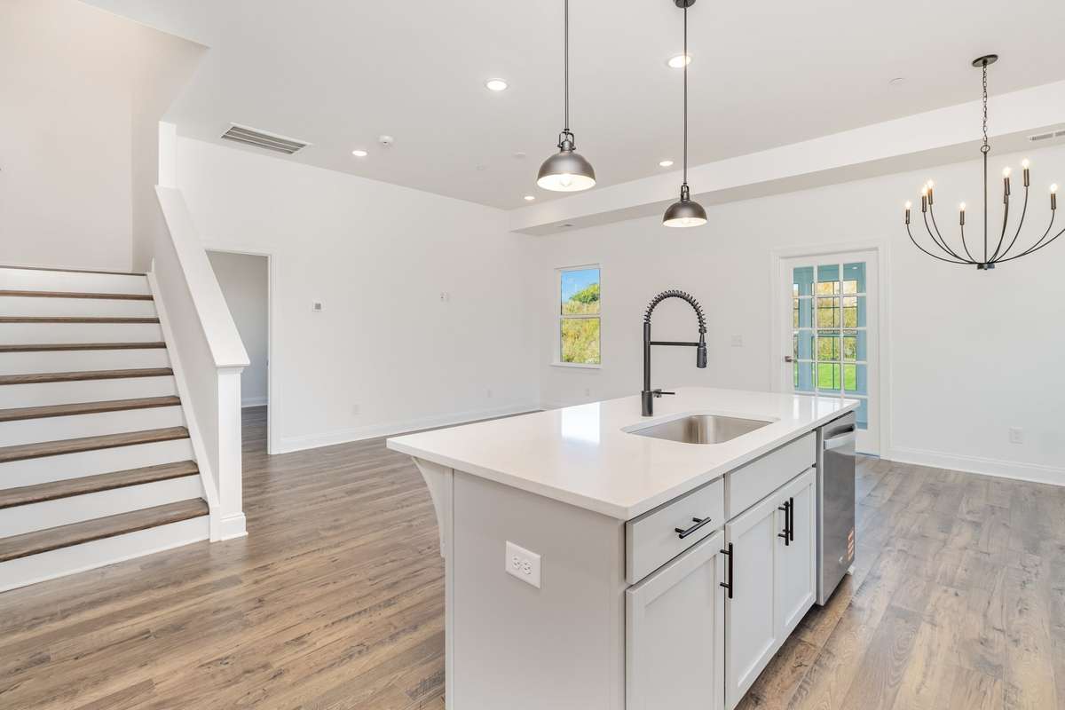 Your new kitchen is open to the great room which makes it perfect for entertaining guests! *Photos not of exact home*