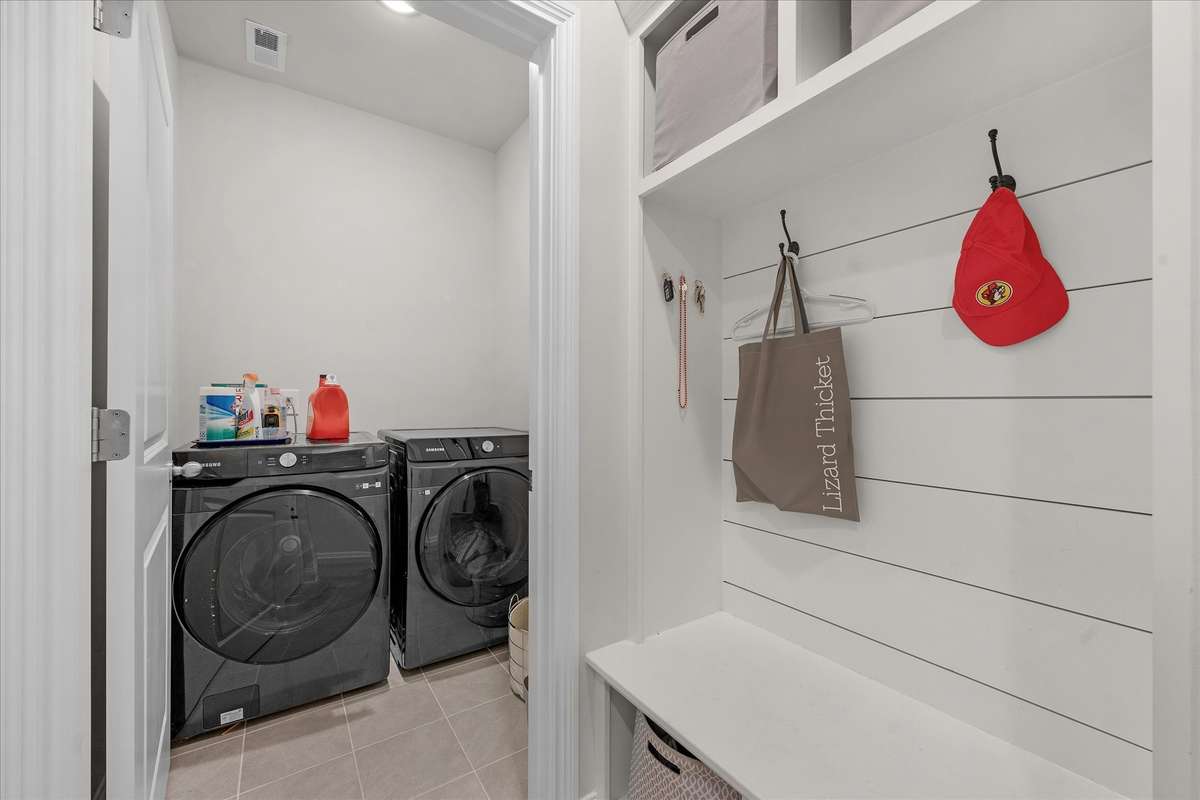 Just off the garage is a great drop zone and the utility room.