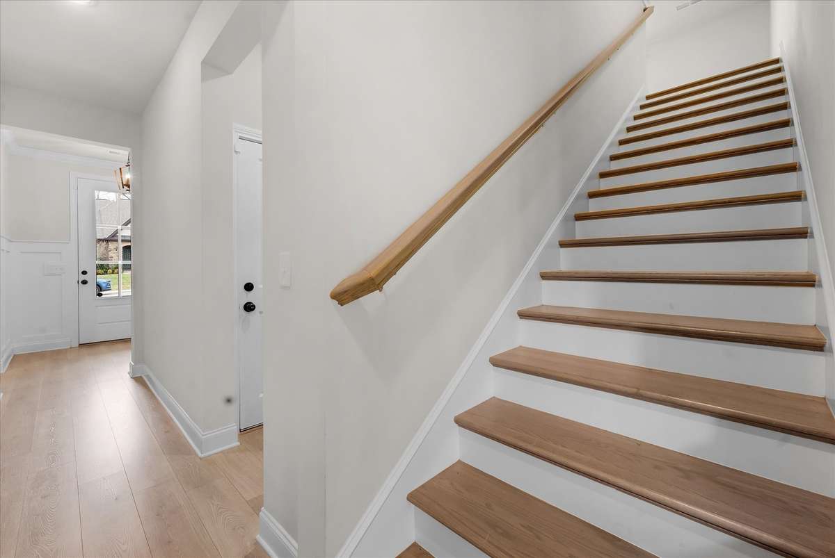 You'll appreciate the hardwood stair treads. No carpet here!