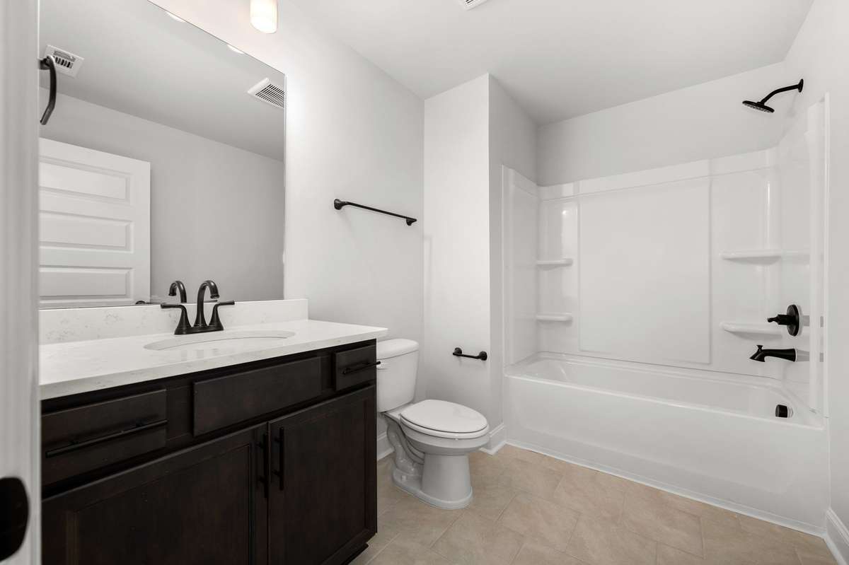 Photos shown are of a completed home of the same floorplan and are for reference purposes only. Options and colors may vary.